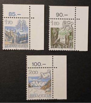 Testo alternativo: Francobolli svizzeri 1983 con valori 170, 180 e 200 in angolo di foglio Titolo: Svizzera 1983 – Francobolli ordinari in angolo di foglio